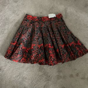 NWT Francis & Benedict mini a line skirt. Size L. Has pockets.